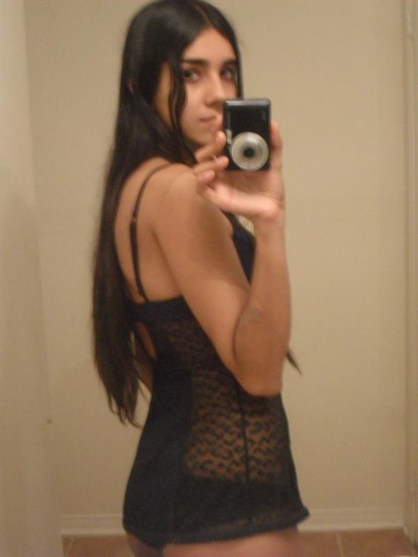 Anonymous in lingerie taking a selfie