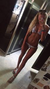 Anonymous in a bikini taking a selfie