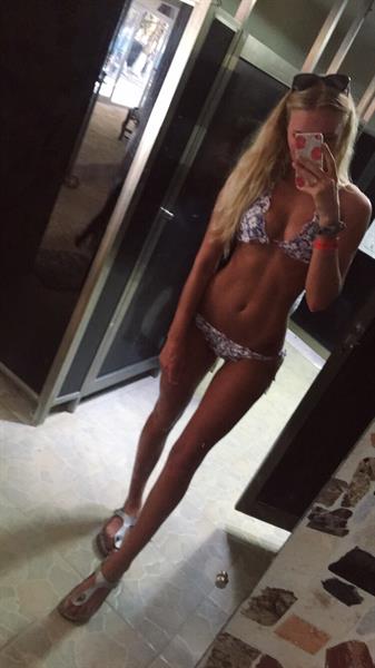 Anonymous in a bikini taking a selfie