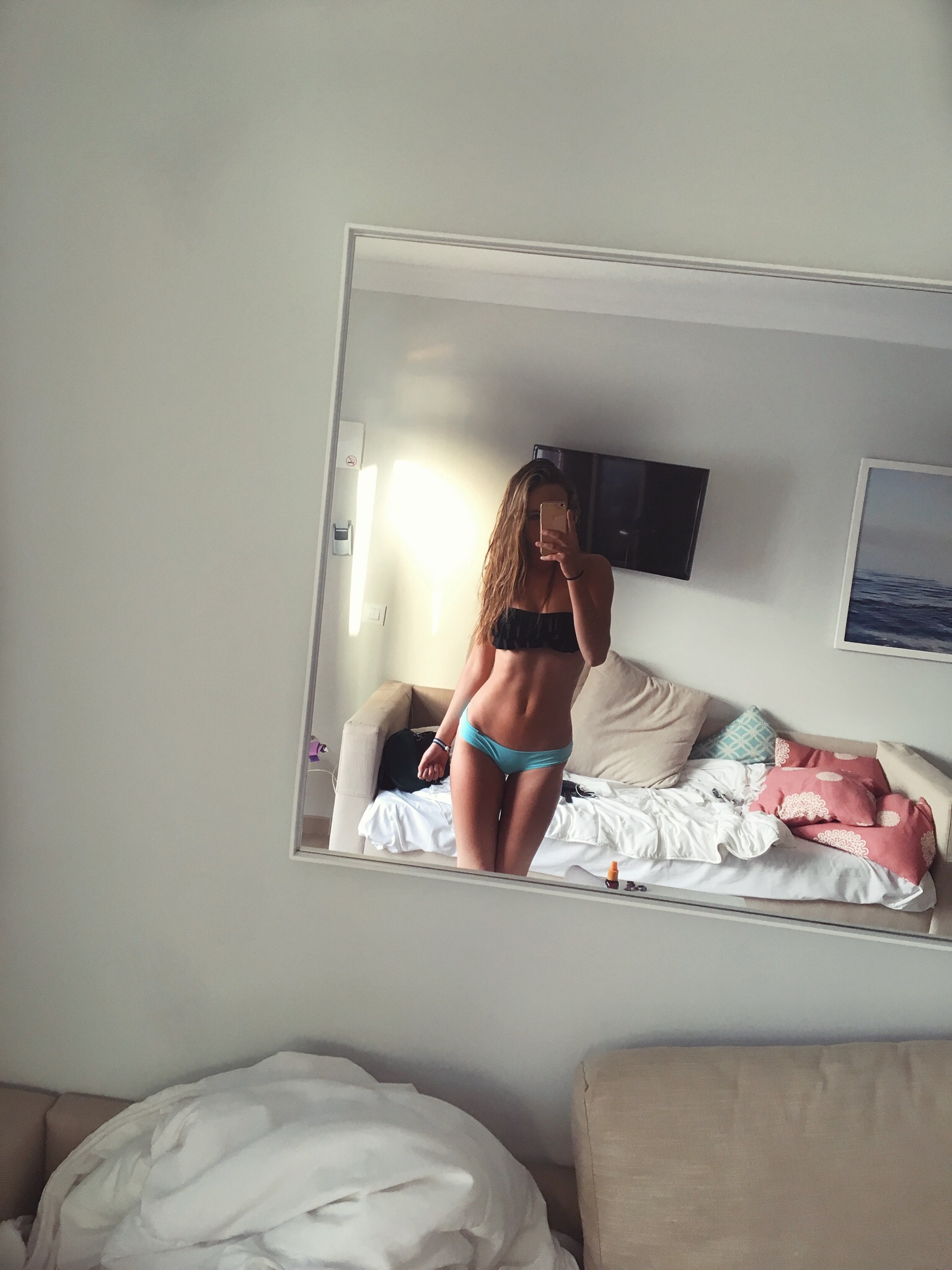 ida vartia in a bikini taking a selfie