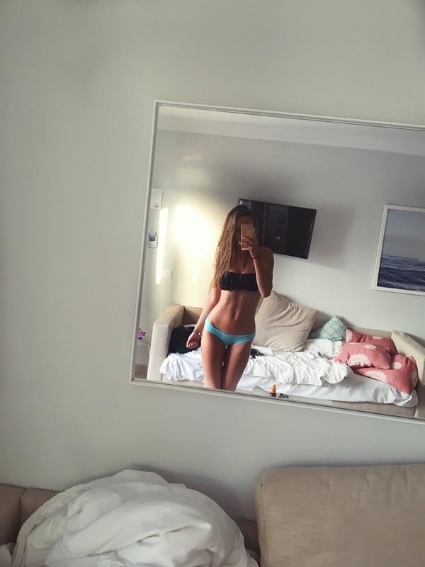 ida vartia in a bikini taking a selfie