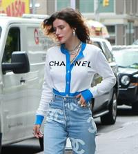 Bella Thorne braless tits seen by paparazzi showing her pierced nipple dressed all in Chanel.






