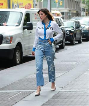 Bella Thorne braless tits seen by paparazzi showing her pierced nipple dressed all in Chanel.






