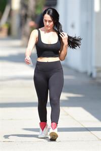 Nikki Bella braless in a see through top showing her boobs seen by paparazzi.







