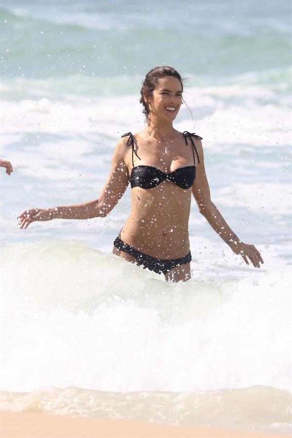 Alessandra Ambrosio sexy ass bikini body seen by paparazzi at the beach.

