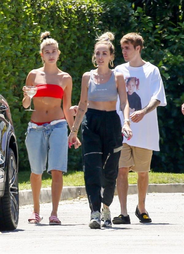 Hailey Baldwin Bieber in a sexy red bikini out with Justin Bieber seen by paparazzi.




