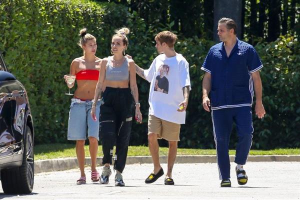 Hailey Baldwin Bieber in a sexy red bikini out with Justin Bieber seen by paparazzi.




