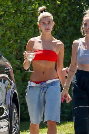 Hailey Baldwin Bieber in a sexy red bikini out with Justin Bieber seen by paparazzi.




