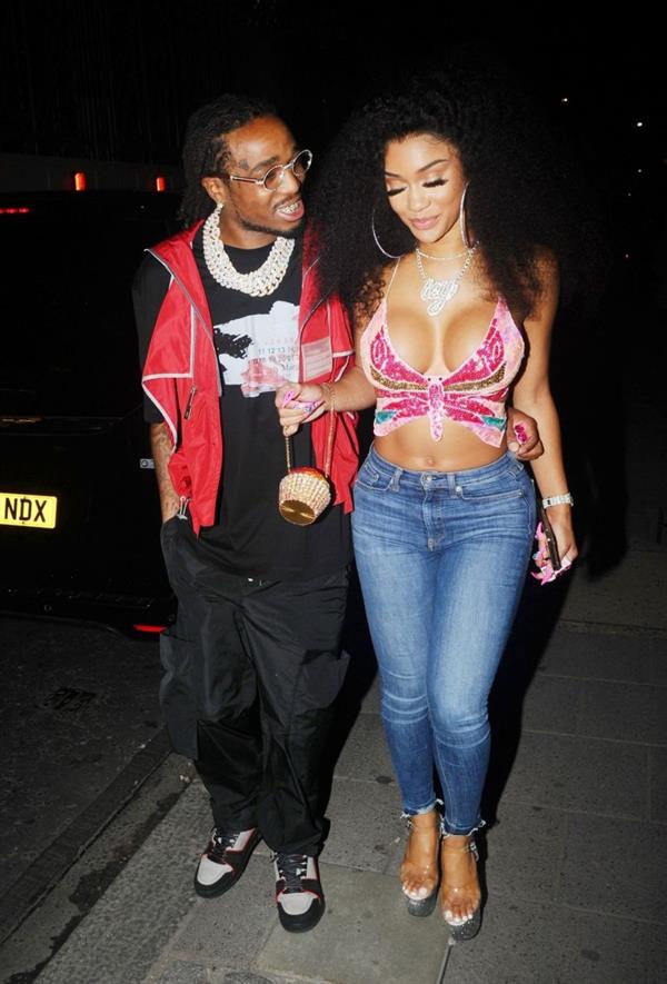 Saweetie sexy boobs showing nice cleavage seen by paparazzi with Quavo.












