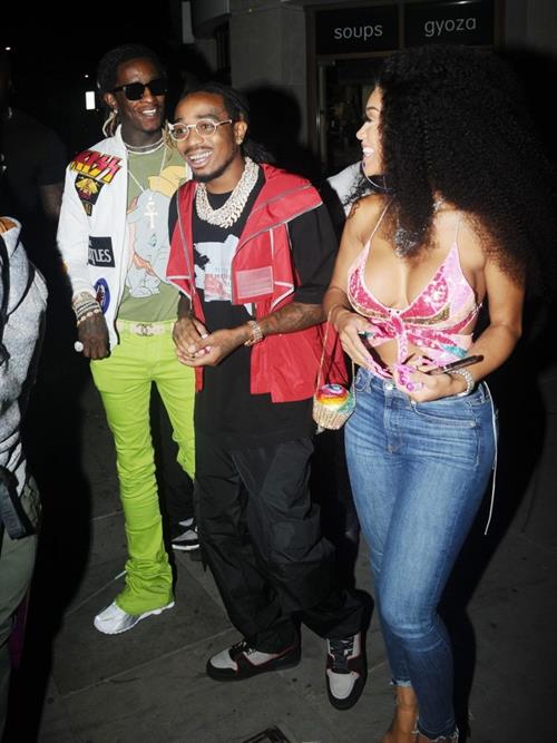 Saweetie Pictures Saweetie sexy boobs showing nice cleavage seen by paparazzi with Quavo.
