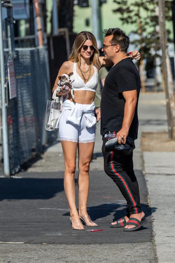 Rachel McCord sexy in a bra top and cameltoe seen by paparazzi.







