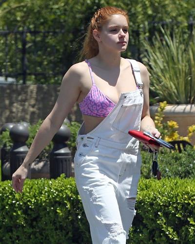 Ariel Winter areola peek in a sexy bikini top seen by paparazzi buying liquor.









