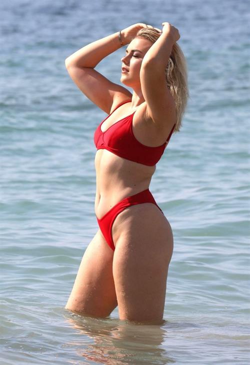Tallia Storm Bikini Pictures Tallia Storm sexy in a red bikini seen by paparazzi at the beach.