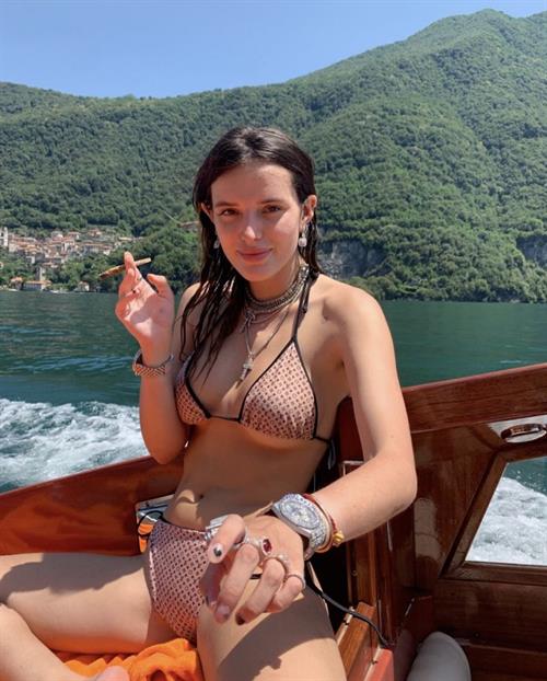 Bella Thorne Bikini Pictures Bella Thorne sexy and high in a bikini smoking weed.
