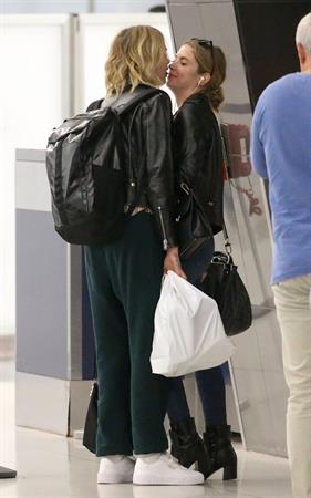 Cara Delevingne and Ashley Benson kissing at the airport.























