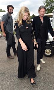 Kate Moss braless tits pokies in a black dress seen by paparazzi.



























