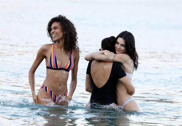 Kendall Jenner sexy ass in a thong bikini seen by paparazzi in the water at the beach.




























