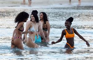 Kendall Jenner sexy ass in a thong bikini seen by paparazzi in the water at the beach.





























