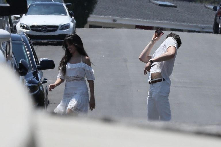 Camila Cabello sexy ass in a white dress seen with Shawn Mendes by paparazzi.


