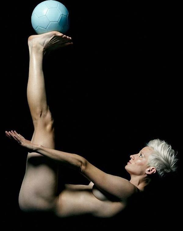 Megan Rapinoe nude and sexy photo shoot showing off her ass, boobs, and giving the finger to Trump.























