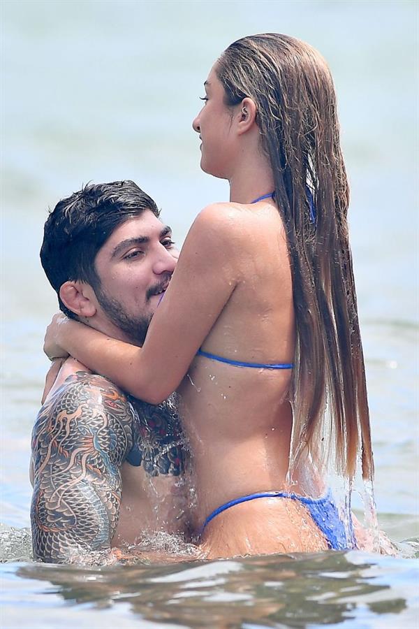 Savannah Montano sexy ass and cleavage in a thong bikini at the beach with Dillon Danis seen by paparazzi.



