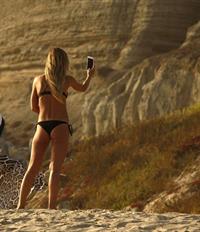 Audrina Patridge sexy ass in a thong bikini at the beach seen by paparazzi.






