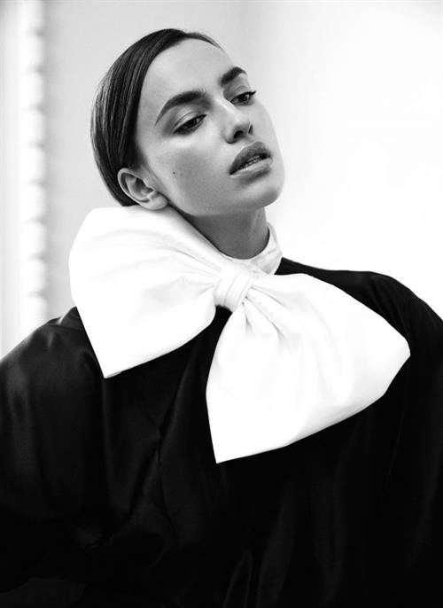 Irina Shayk Pictures Irina Shayk topless and sexy photo shoot for HarpersBazaar.com covering her nude boobs with her hands.