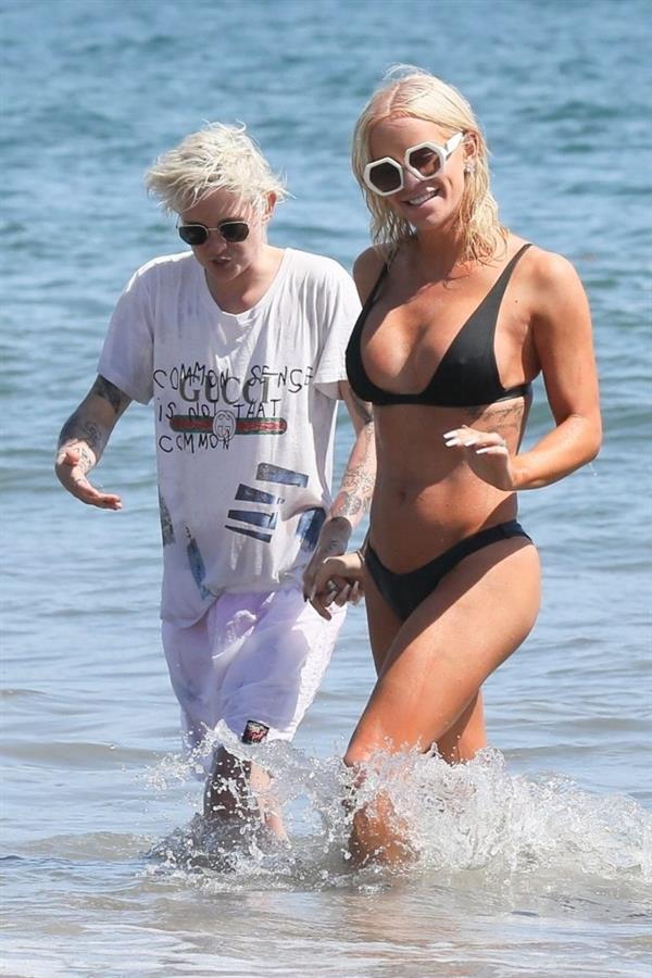 Gigi Gorgeous sexy cleavage in a bikini at the beach with Nats Getty seen by paparazzi.



