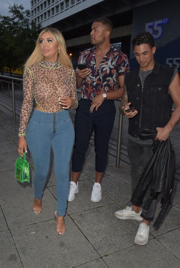 Chloe Ferry braless boobs in a see through top seen by paparazzi showing off her tits and ass.





