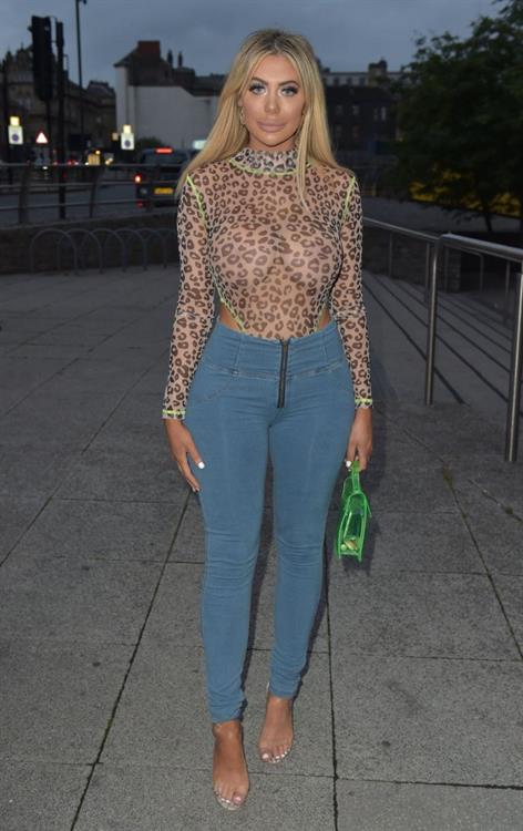 Chloe Ferry Pictures Chloe Ferry braless boobs in a see through top seen by paparazzi showing off her tits and ass.