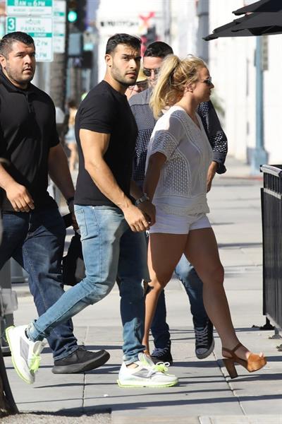 Britney Spears braless boobs in a see through blouse showing her nipples seen by paparazzi.


