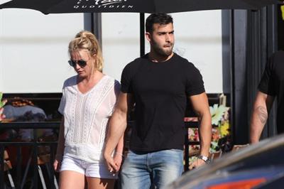 Britney Spears braless boobs in a see through blouse showing her nipples seen by paparazzi.


