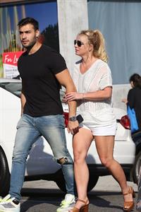 Britney Spears braless boobs in a see through blouse showing her nipples seen by paparazzi.


