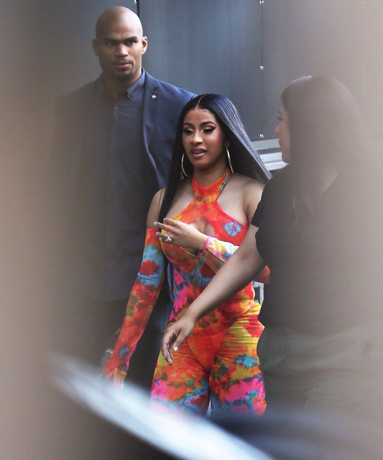 Cardi B boobs and booty on display on and off stage showing nice cleavage and her sexy ass in a tight dress.























