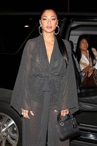 Nicole Scherzinger sexy in a see through outfit showing her braless boobs and ass seen by paparazzi.
