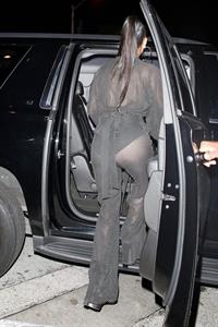 Nicole Scherzinger sexy in a see through outfit showing her braless boobs and ass seen by paparazzi.
