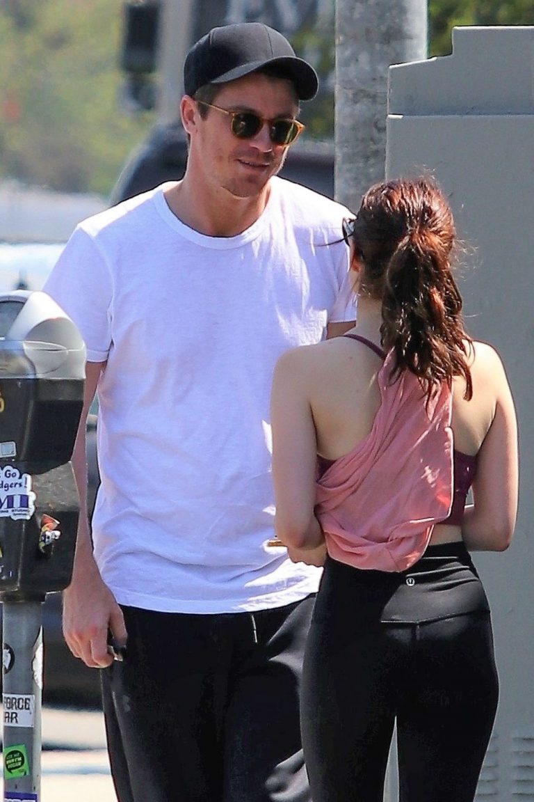 Emma Roberts Pictures Emma Roberts sexy little ass and thigh gap in tight pants seen by paparazzi with Garrett Hedlund.