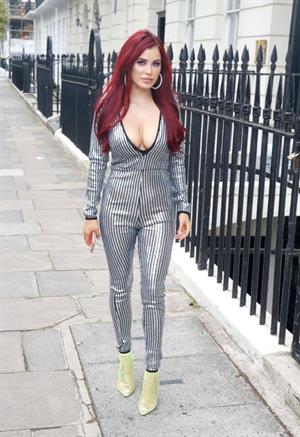 Carla Howe braless boobs showing nice cleavage in London.




