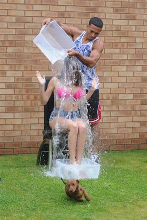 Chloe Goodman gets water dumped on her