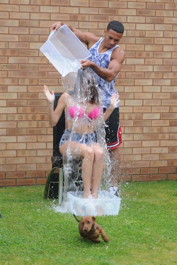 Chloe Goodman gets water dumped on her