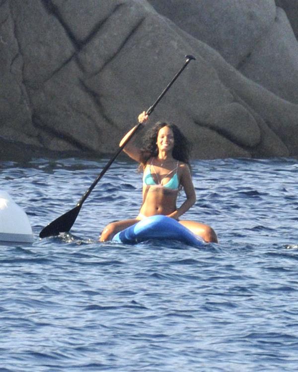 Rihanna paddle boarding