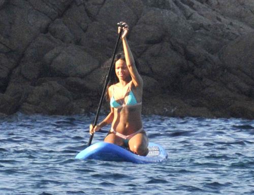 Rihanna paddle boarding