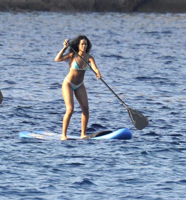 Rihanna paddle boarding