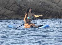 Rihanna paddle boarding