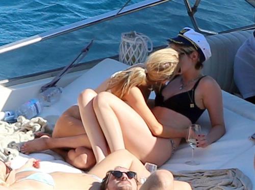 Kristen Stewart Bikini Pictures Kristen Stewart and Stella Maxwell sexy lesbians making out on a boat in bikinis seen by paparazzi.