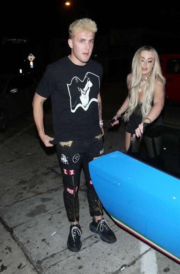 Tana Mongeau sexy cleavage in a revealing little outfit with Jake Paul.












