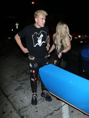 Tana Mongeau sexy cleavage in a revealing little outfit with Jake Paul.











