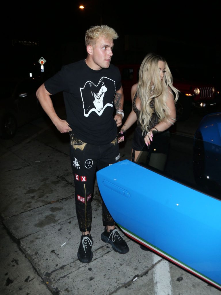 Tana Mongeau Pictures Tana Mongeau sexy cleavage in a revealing little outfit with Jake Paul.