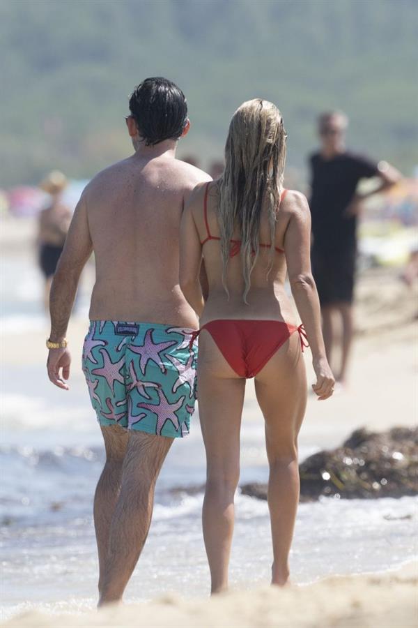 Sylvie Meis sexy ass in a bikini at the beach with her new boyfriend at the beach seen by paparazzi.















