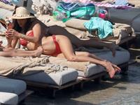 Alessandra Ambrosio perfect model body in a sexy little thong bikini seen at the beach by paparazzi showing nice cleavage and ass.





















